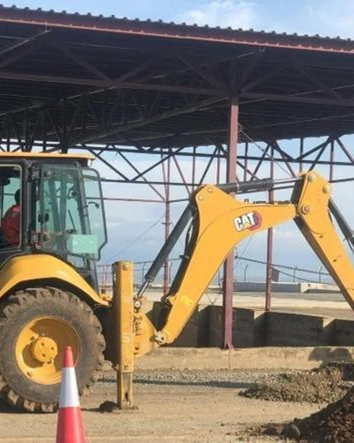 Backhoe loader working on site